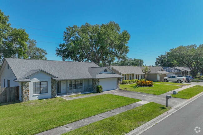 In Bloomingdale, ranch-style homes have attached garages, driveways, and spacious front lawns.