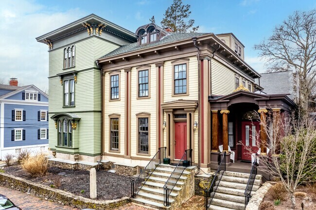 Unique architectural details define a Historic Hill Greek Revival home.