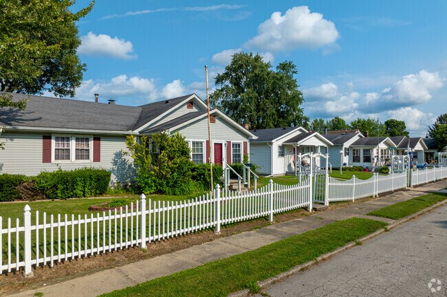 White picket fences add charm to this row of Bon Air homes.