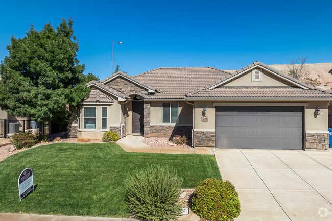 Homes in Hidden Valley typically have well-kept front lawns and multi-car garages.