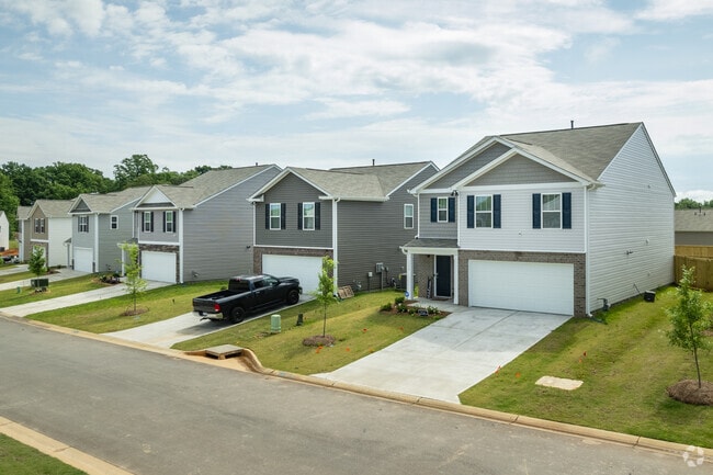 Newly constructed modern homes with a colonial influence are popping up all over Roebuck, SC.