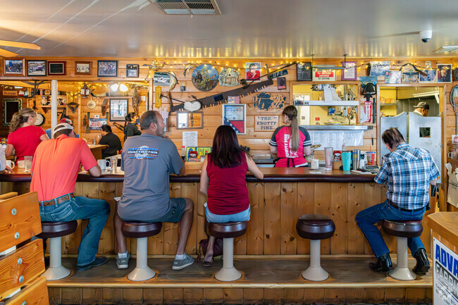 Friends gather for a hearty breakfast at Cope's Knotty Pine Cafe near Meadow View.