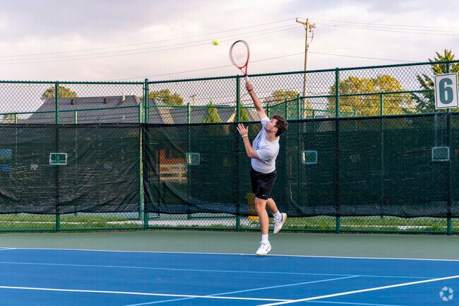 Play a game of tennis with friends at Russell Shifley Park in Park Shifley-York.