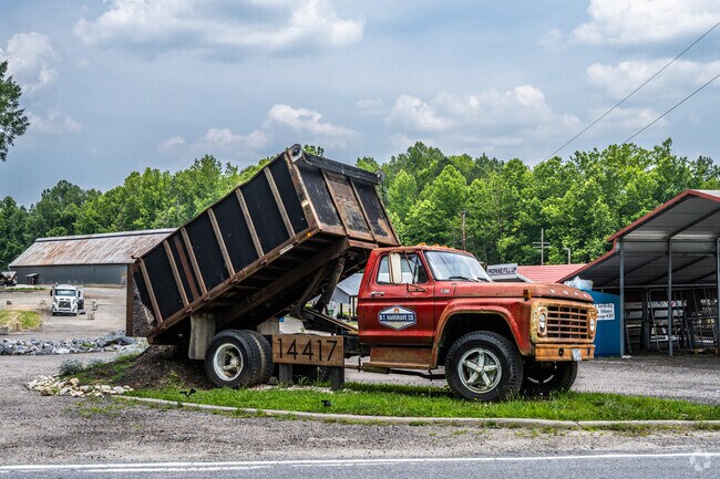 An old dump truck is used as a display for the local B. T. Hargrave Co. near North Dinwiddie.