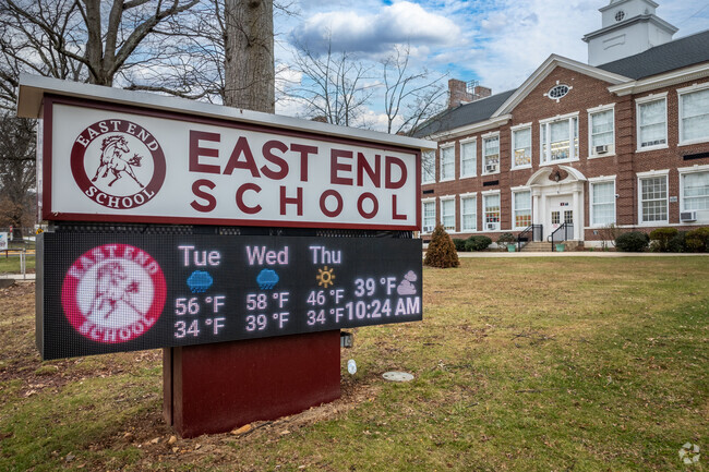 Roadside signage with a weather forecast at East End Elementary School, North Plainfield, NJ.