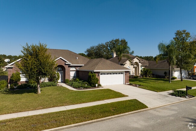 Several homes in Deerwood feature brick exteriors.