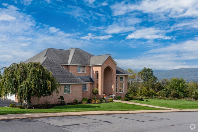 In Hughestown, large single family homes offer beautiful views of mountains.