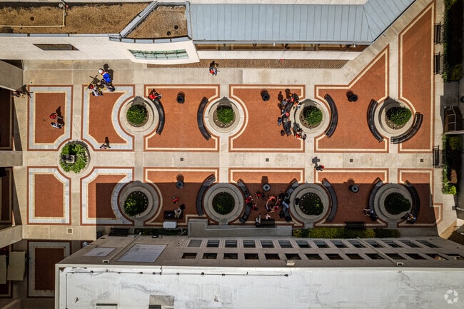 St Thomas High School students enjoy seating in the courtyard in Memorial Heights.