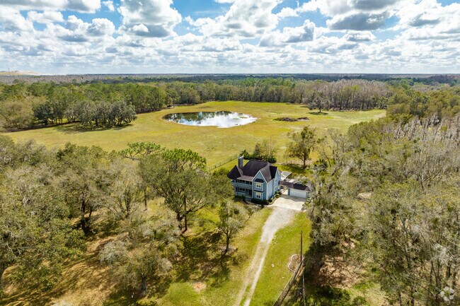 House with vast grassland in the Crystal Springs neighborhood.