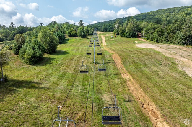 Gore Mountain towers over North Creek and is a destination for winter sports enthusiasts.