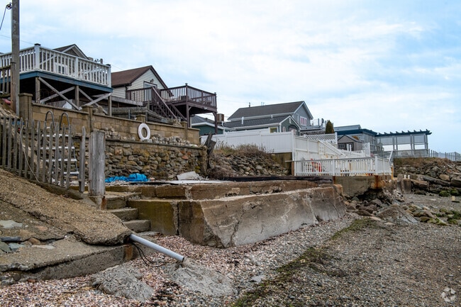 Brayton Point’s shoreline features homes with backyard access to calm tidal waters.