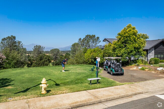 You get to walk out your home and tee off at the golf course in Gold Hills.
