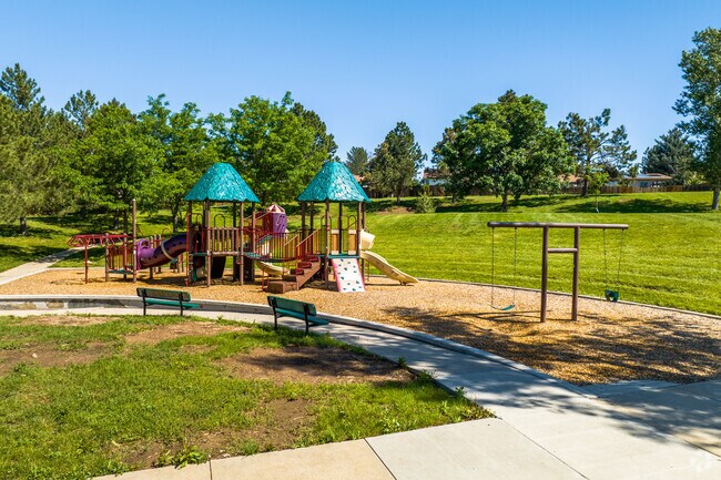 Kids can climb on the playground at Crestline Park in the Smoky Hill neighborhood.