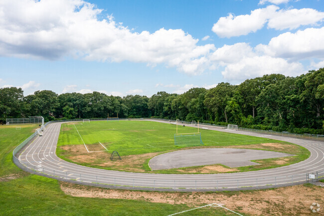 Take some laps around the track behind Udall Road Middle School.