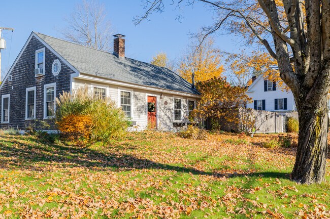 A classic Cape Cod in Hillsboro with quaint charm, timeless New England style, & cozy appeal.