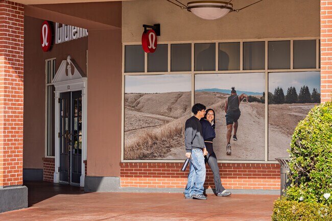 A young Laurelglen couple enjoys walking around The Marketplace stores nearby.