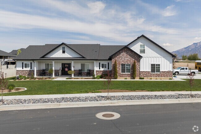 A beautiful home with brick detail in Plain City.