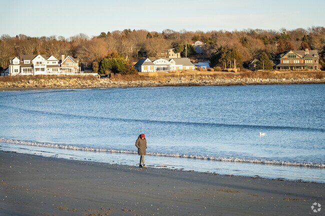 Take a stroll along Mackeral Cove Beach, a popular spot in East Passage Estates, RI.