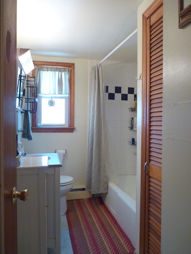 Full bath with shower and linen closet