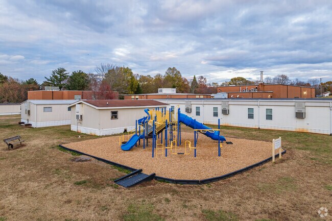 Bolton Elementary School features a playground and separate classrooms.