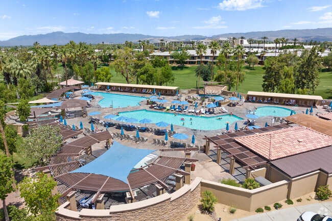 Welcome to the poolside of pleasure, where food and fun coexist at Water's Edge Bar & Grill.