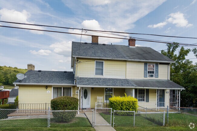 A two family home in the center of Muse offers cozy living in a country setting.