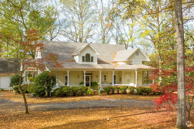 Sit on the front porch of this amazing Columbiana home and wave to the neighbors.