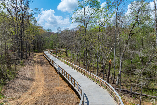 The newly constructed walking paths, adorned with several charming boardwalks, seamlessly connect multiple city parks sprinkled throughout Auburn, inviting residents and visitors alike to explore the natural beauty and tranquil settings they offer.