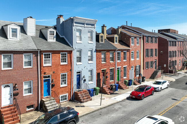 Two and three bedroom story townhomes in Sharp-Leadenhall are affordable and safe.
