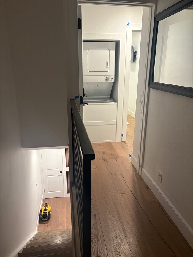 Entry from front door, Staircase to Private Suite