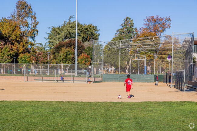 Children enjoy playing around on Washington Parks' green space and ball field.