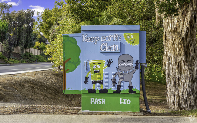 A mural reminds Meadowbrook residents to keep the earth and the community clean.