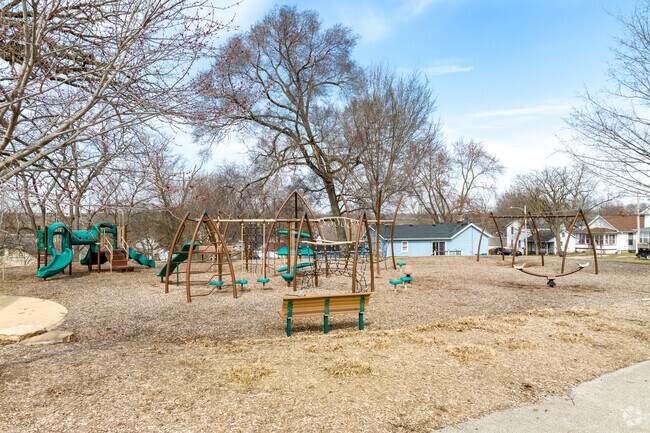 Bluff Street Park features a playground, open field space, and a basketball court.