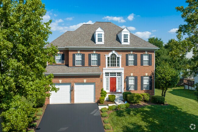 Stately brick Colonial Revivals are a Bull Run East hallmark.