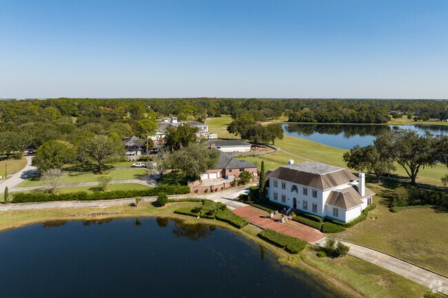 Large estates in Deerwood sit on waterfront lots.