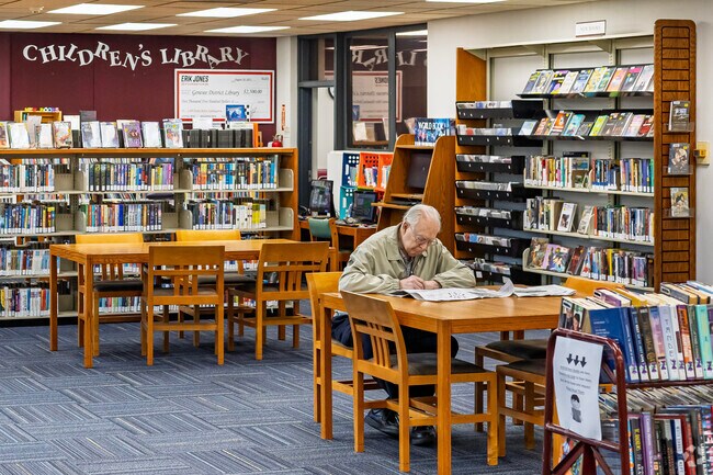 Genesee District Library greets Merill visitors with a reading area and vibrant kids section.