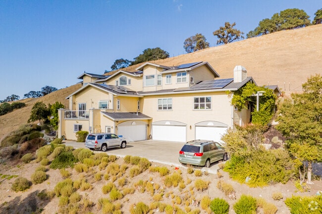 A three car garage traditional style home in the hills of Rancho San Miguel