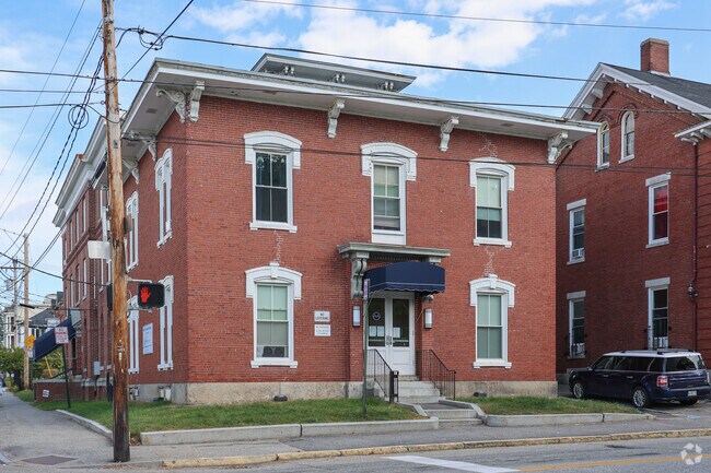 Older large brick homes have been converted into multifamily homes in Downtown Lewiston.