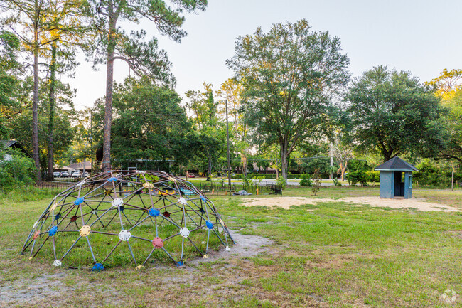Kids play on the playground at Laniakea Montessori School.