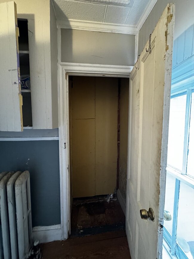 Large storage closet in bathroom