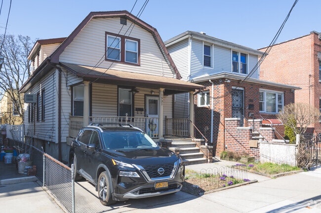 Classic single family homes sit alongside newer brick faced homes in Middletown-Pelham Bay.