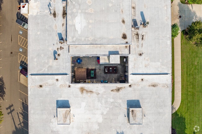 Horace Mann Elementary features an outdoor rec area in the middle of the building.