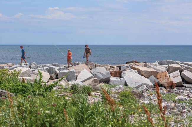Anglers are drawn to Rye Harbor State Park to cast their lines from the rugged, scenic jetty that extends into the Atlantic, offering prime fishing opportunities and panoramic ocean views.