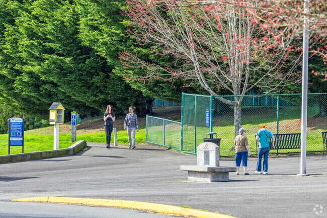 Locals stroll through Celebration Park as a great way to start the day in Kitts Corner Washington.