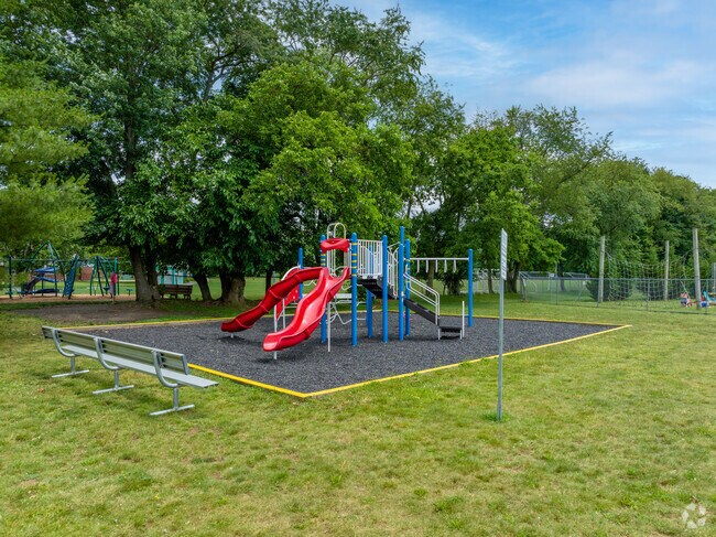 The playground at Memorial Elementary School is in a park like setting in Freehold Township NJ.