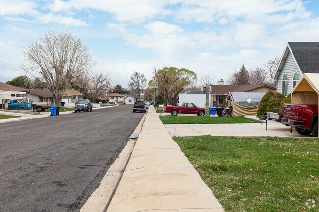 Residential streets are lined with sidewalks in Orem Park.