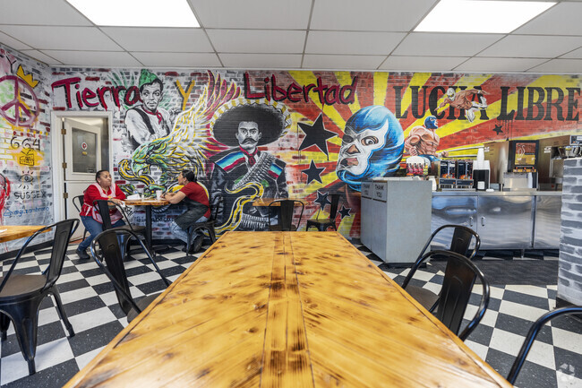 The interior of Castro's Bakery in King City is decorated with colorful murals.