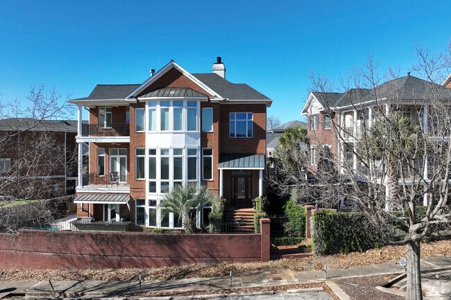 Stately Charleston-style homes in Arsenal Hill often have several porches. for relaxing outdoors.