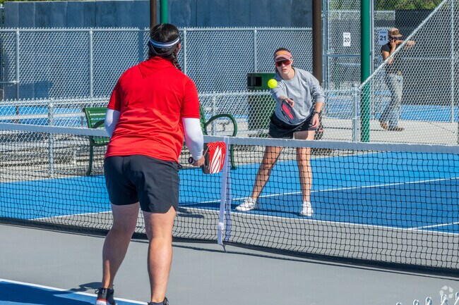Pickleball players love the new professional courts at Manzano Mesa, less than a mile away from Four Hills Mobile Home Park.