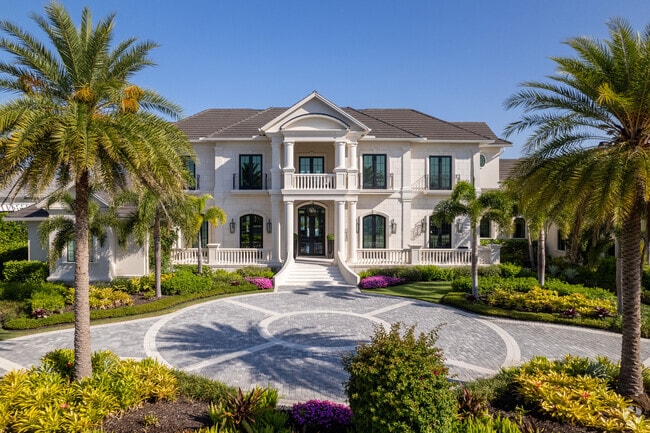 Talis Park has many large mansions and coach homes lining the golf course.